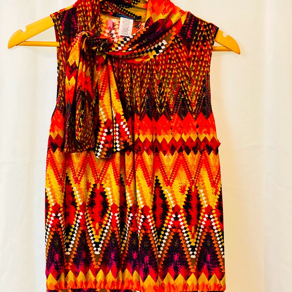 AMERICAN CITY WEAR BLOUSE SLEEVELESS WITH ATTACHED SCARF.
